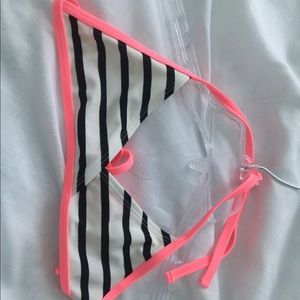 Black and white v-neck bikini top with pink lining